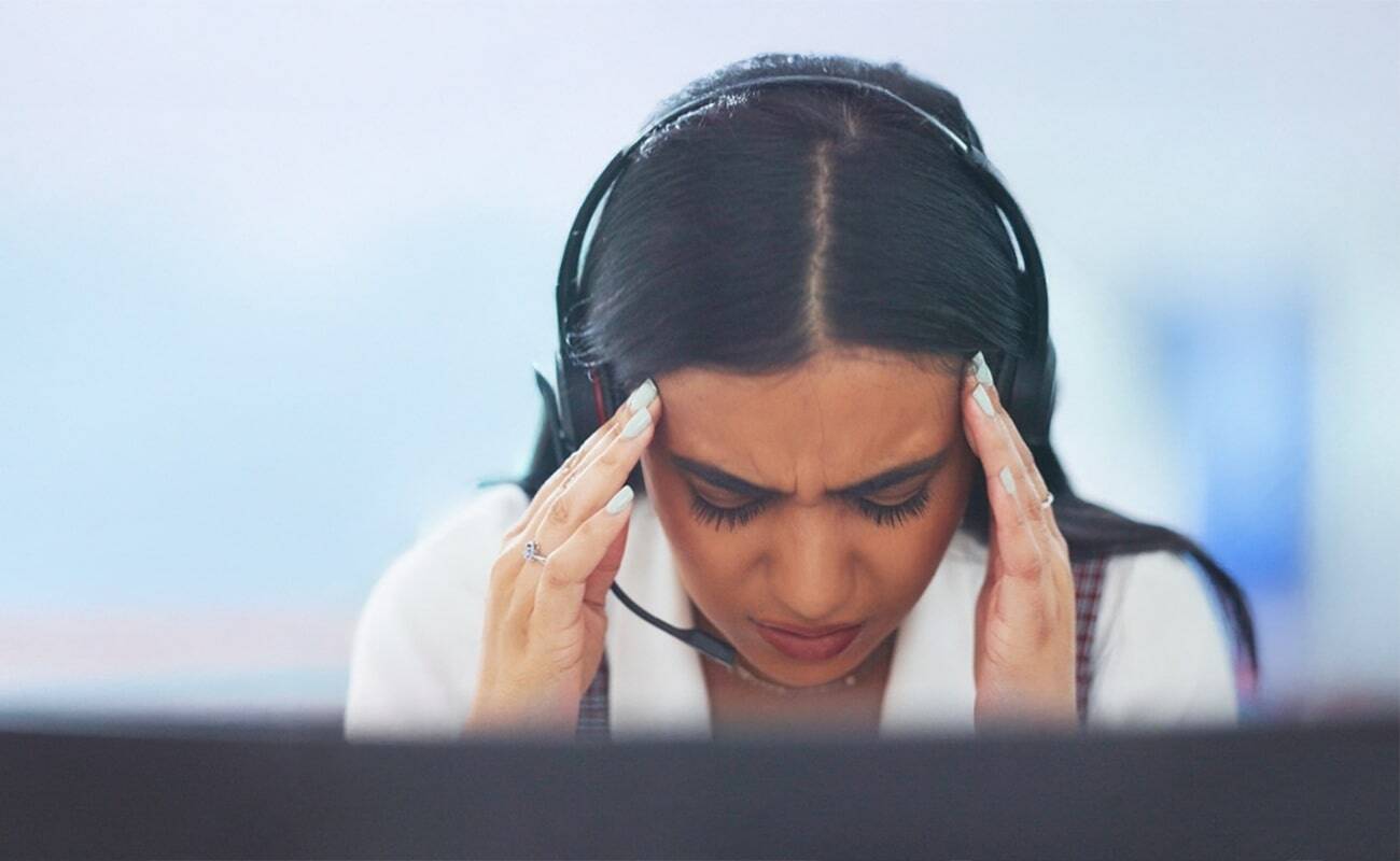 call-centre-worker-headache